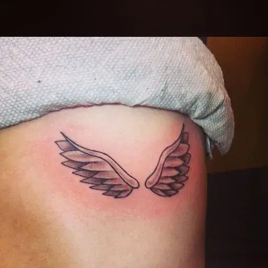 Angel Wings Tattoo on Rib