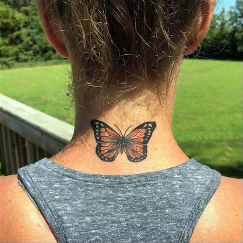 Butterfly tattoos on ear and neck 3