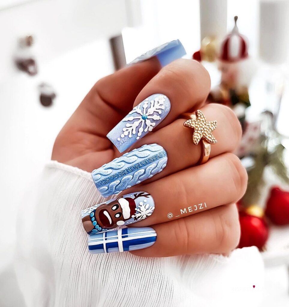 Light blue snowflake nails