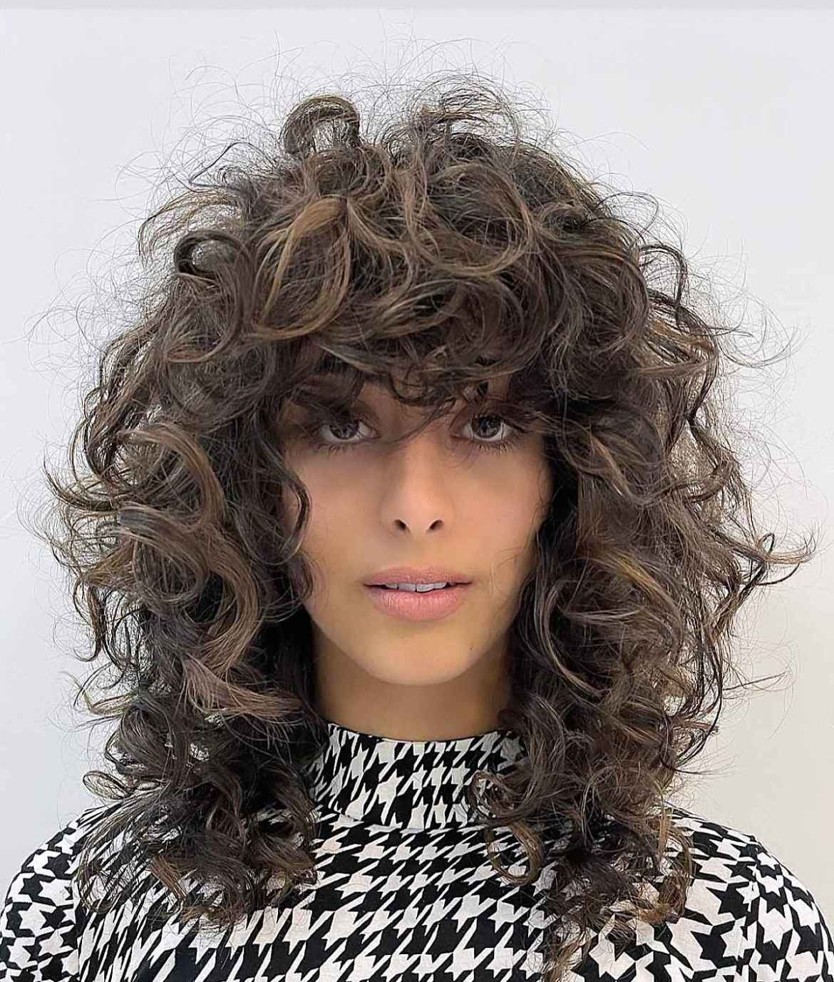 mid length curly shag haircut