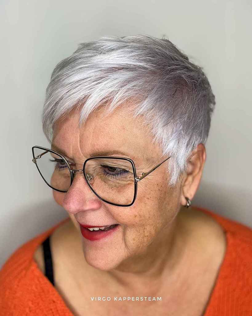 soft grey pixie with wispy bangs for ladies past sixty